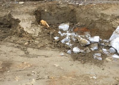 Boulder at Walkway Footing