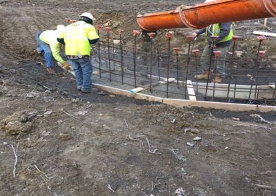 Pouring concrete for Ozawa Gate footings -- Ozawa Hall Gate